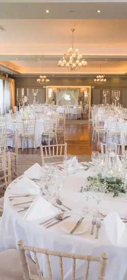the ballroom at The Rine in County Clare, Ireland, decorated for a wedding.